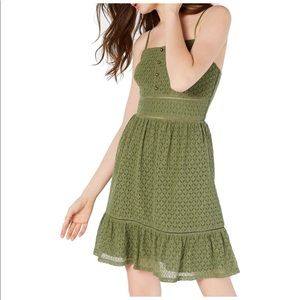 Green patterned dress, bronze buttons